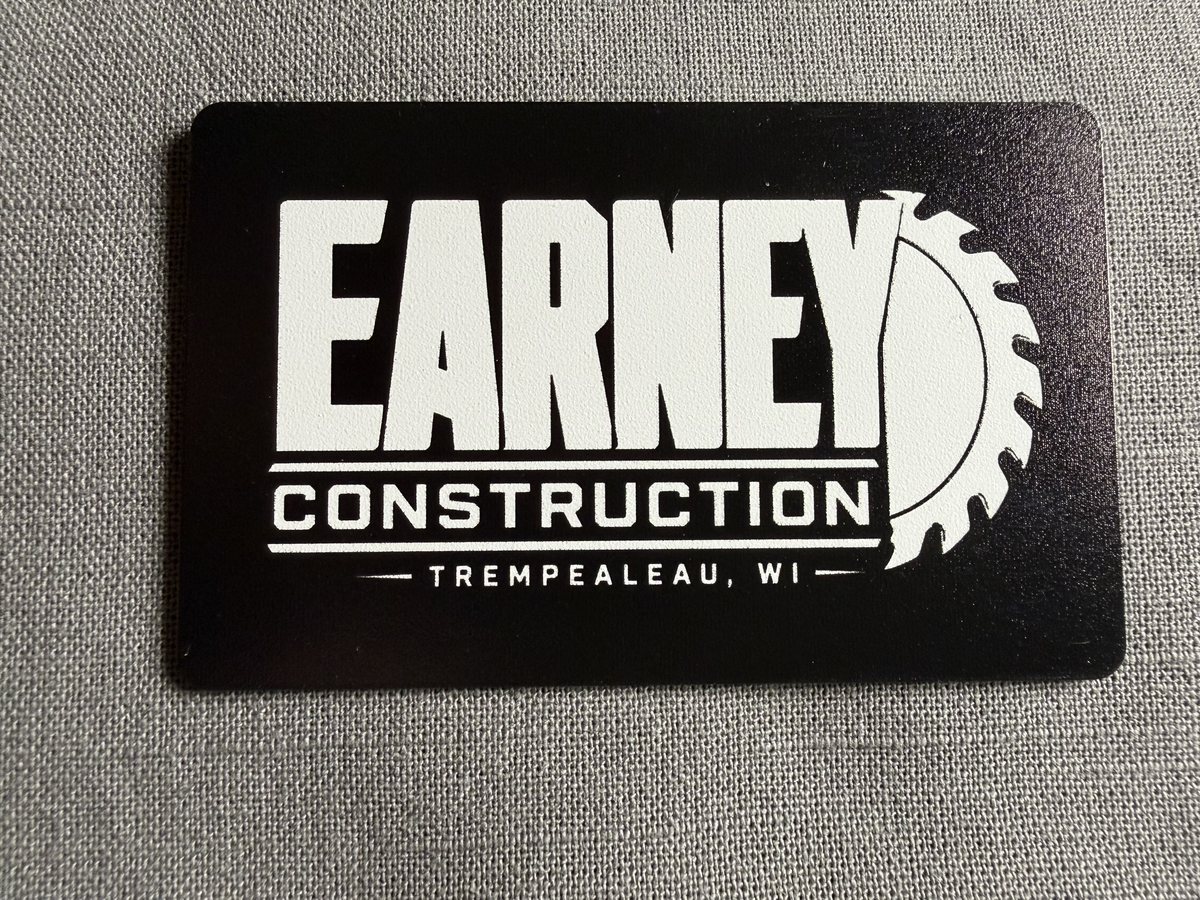 Earney Construction contactless card, white logo UV printed on a black card